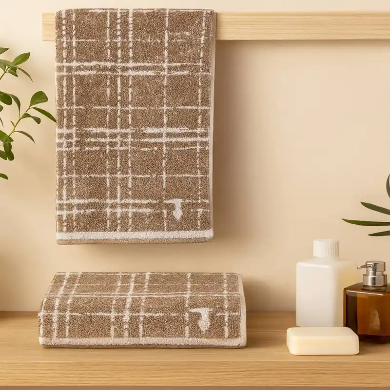 Set 1+1 asciugamano e ospite in spugna Trussardi Scratch beige