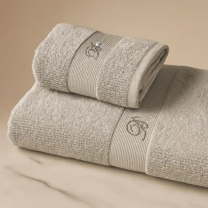 Asciugamani in spugna set 1+1 Blumarine Risveglio con cristalli Silver