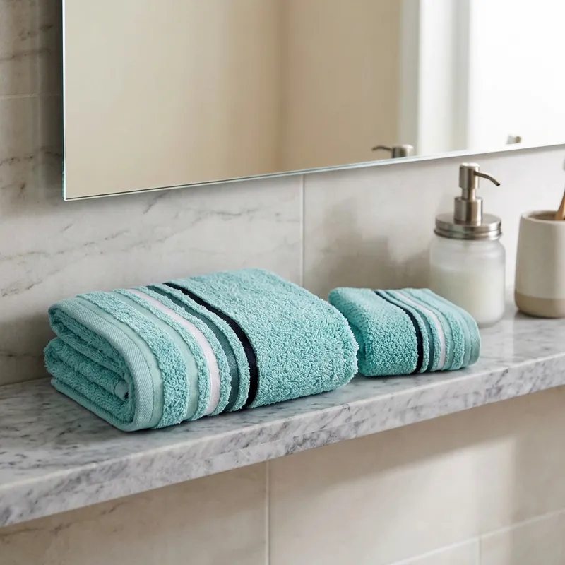 Asciugamano viso + ospite 100% spugna con bordo a a righe Acqua